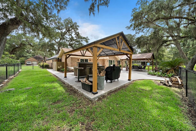 surrounding community with a yard, a gazebo, and a patio