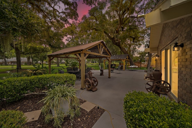 patio terrace at dusk with a gazebo