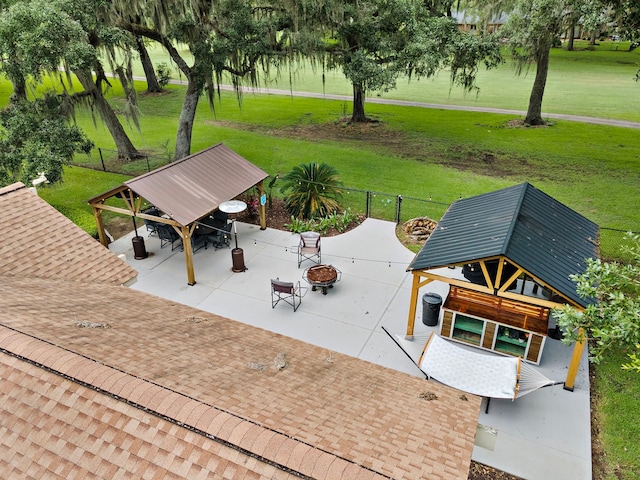 view of patio with a fire pit