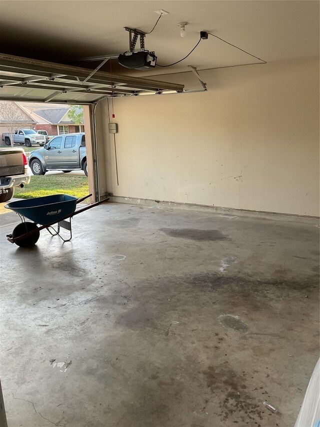 garage featuring a garage door opener