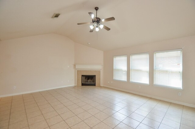 unfurnished living room with visible vents, baseboards, ceiling fan, vaulted ceiling, and a fireplace