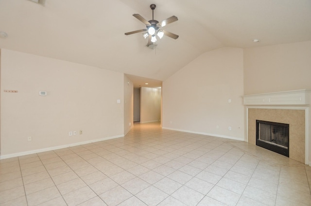 unfurnished living room featuring ceiling fan, high vaulted ceiling, light tile patterned floors, a high end fireplace, and baseboards