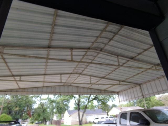 exterior space featuring a carport