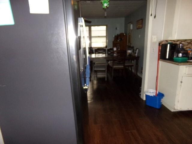 hallway featuring dark wood-type flooring