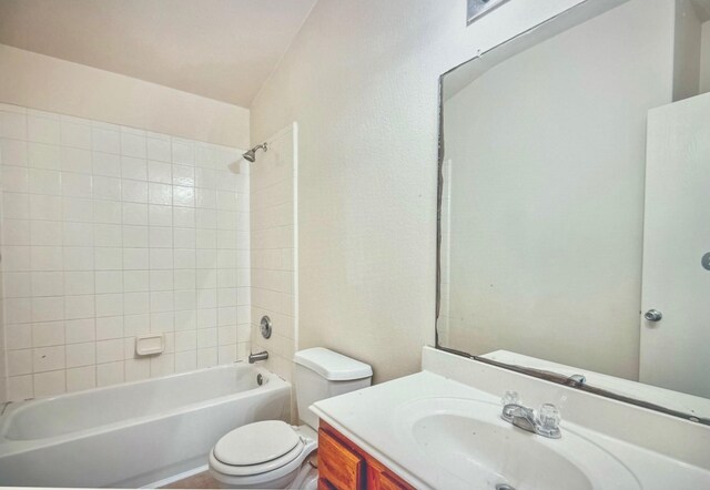 full bath with shower / washtub combination, vanity, and toilet