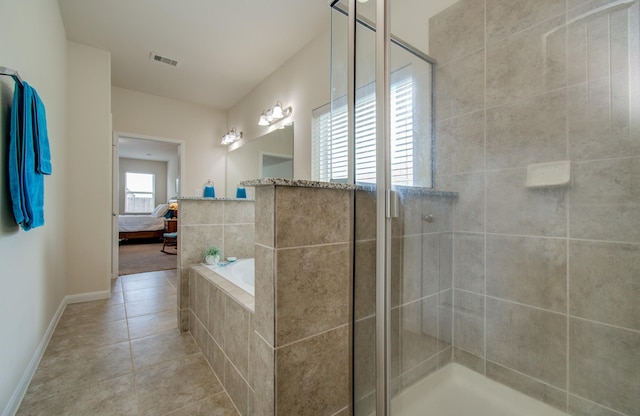bathroom with visible vents, a garden tub, tile patterned flooring, baseboards, and tiled shower