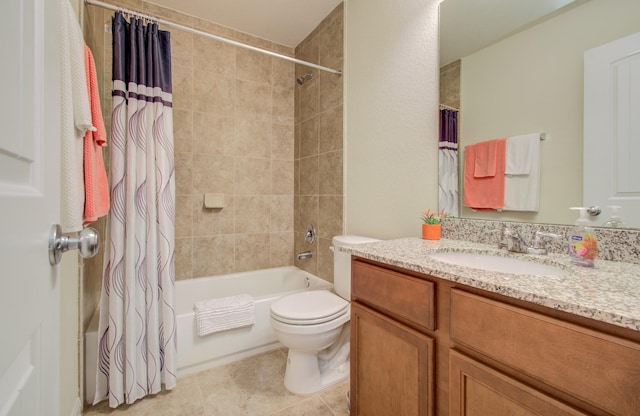 bathroom with vanity, toilet, tile patterned floors, and shower / tub combo