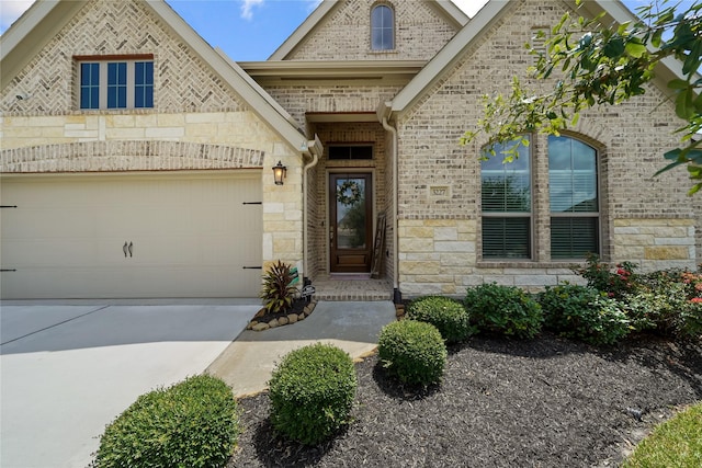 view of front of property with a garage