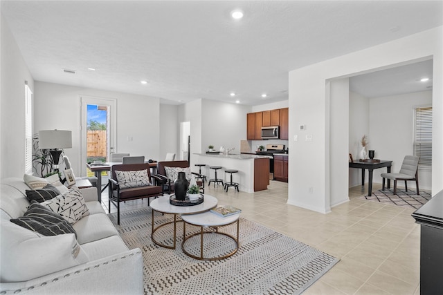 living room with light tile patterned floors