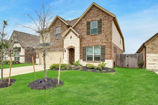 view of front facade featuring a garage and a front lawn