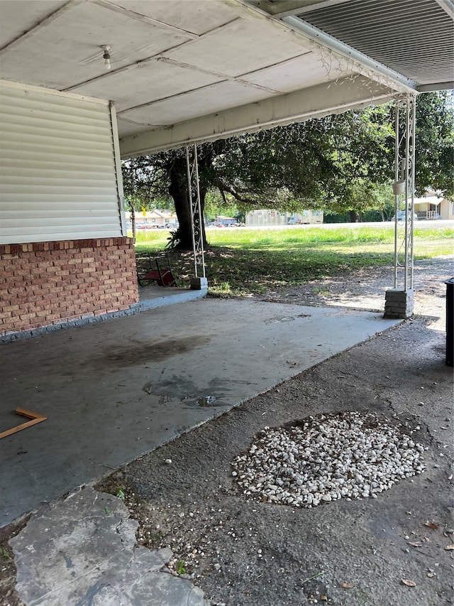 view of patio / terrace featuring a carport