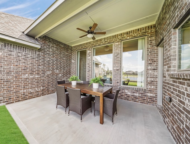 view of patio featuring ceiling fan