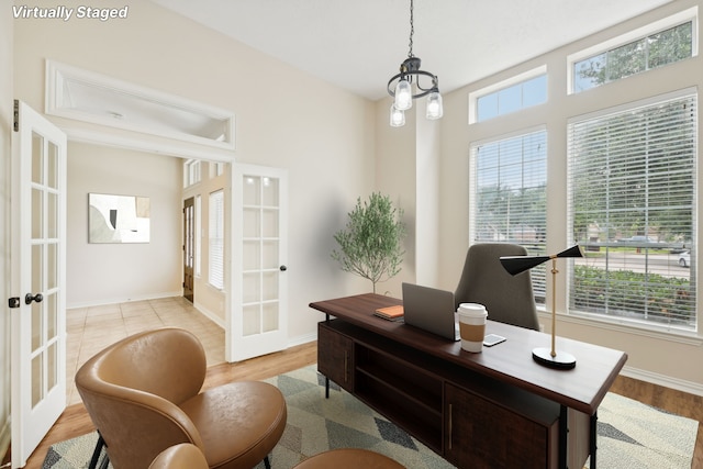 office area featuring french doors and light wood-type flooring