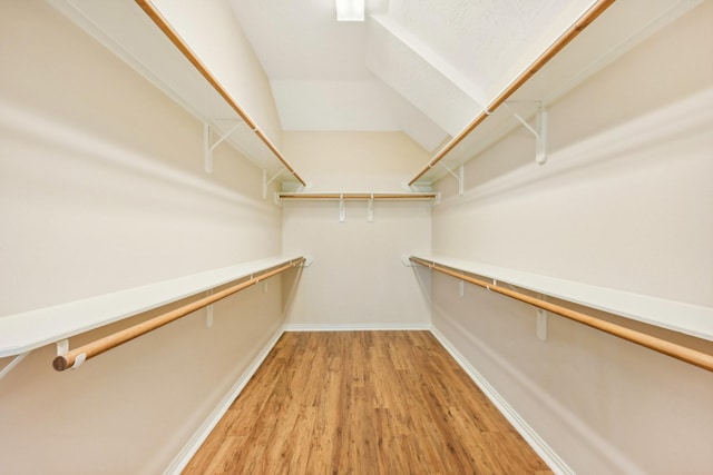 spacious closet featuring light wood-type flooring