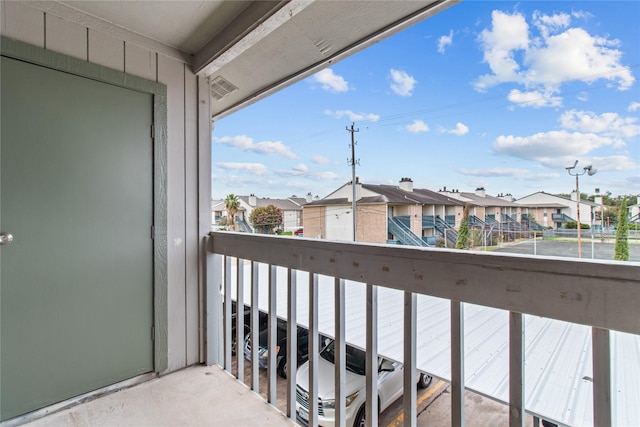 balcony featuring a residential view