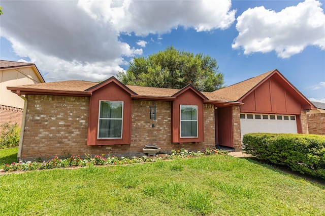 single story home with a front yard and a garage