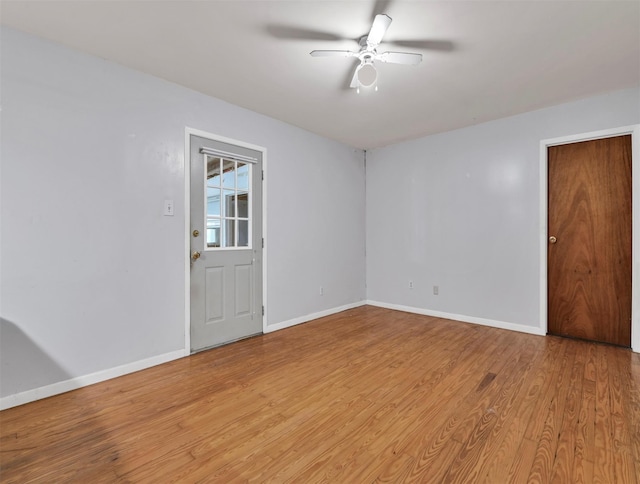 unfurnished room featuring ceiling fan and wood-type flooring