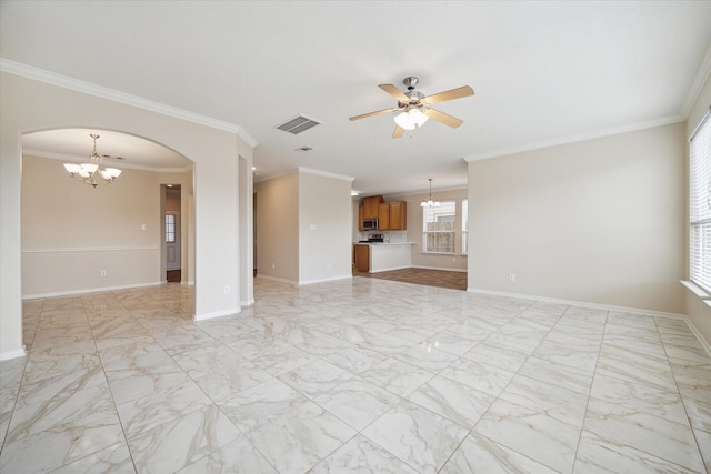 unfurnished living room with ceiling fan with notable chandelier and ornamental molding