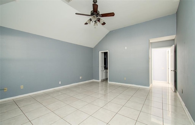 unfurnished bedroom with ceiling fan, light tile patterned floors, and lofted ceiling