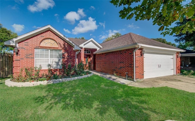 ranch-style home with a front yard and a garage