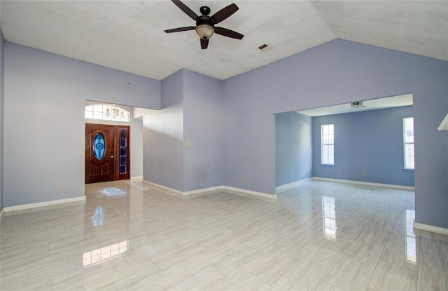 foyer entrance featuring ceiling fan