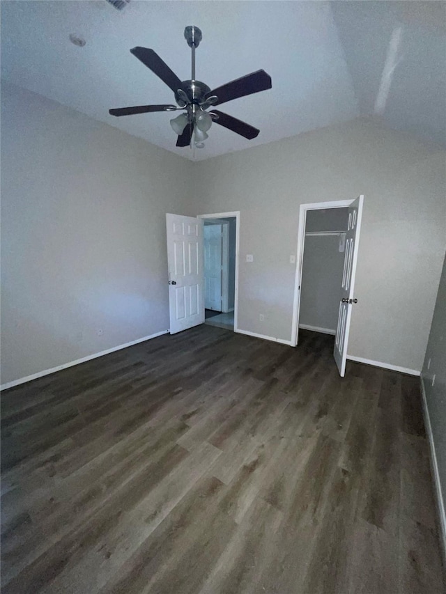 unfurnished bedroom with dark hardwood / wood-style floors and ceiling fan