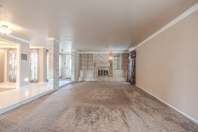 unfurnished living room featuring carpet floors, a fireplace, built in features, and ornamental molding