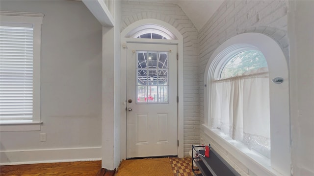 entryway with lofted ceiling