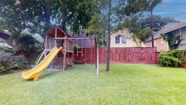 view of playground with a yard