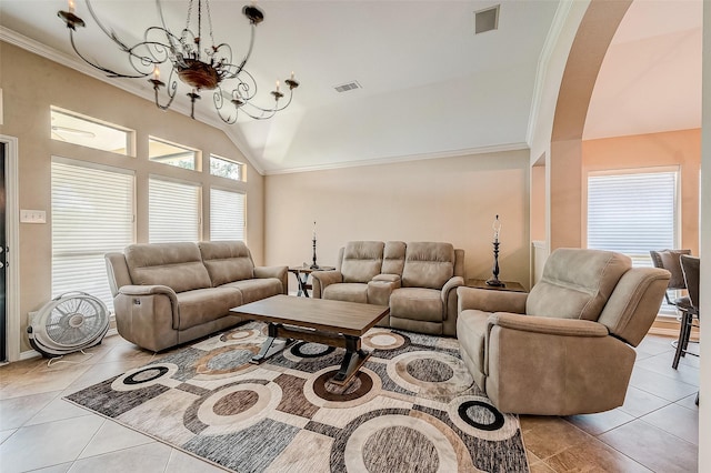 tiled living room with crown molding, lofted ceiling, and a notable chandelier