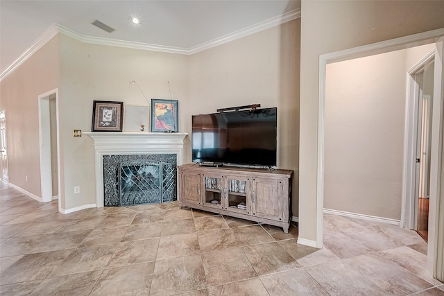 living room with crown molding and a premium fireplace