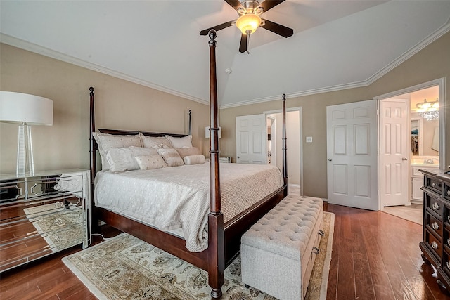 bedroom with vaulted ceiling, ornamental molding, dark hardwood / wood-style floors, and ceiling fan