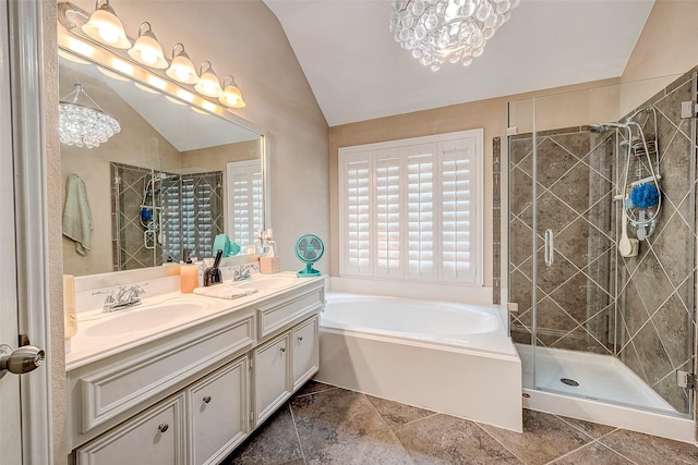 bathroom with vanity, lofted ceiling, shower with separate bathtub, and a notable chandelier