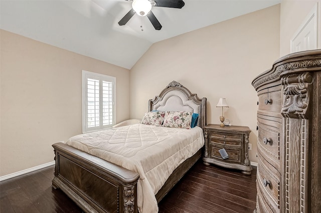 bedroom with ceiling fan, lofted ceiling, and dark hardwood / wood-style flooring