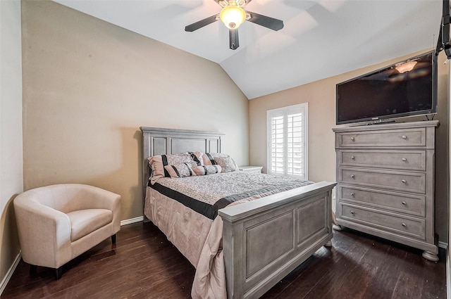 bedroom featuring lofted ceiling, dark wood-type flooring, and ceiling fan