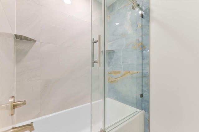 bathroom featuring enclosed tub / shower combo