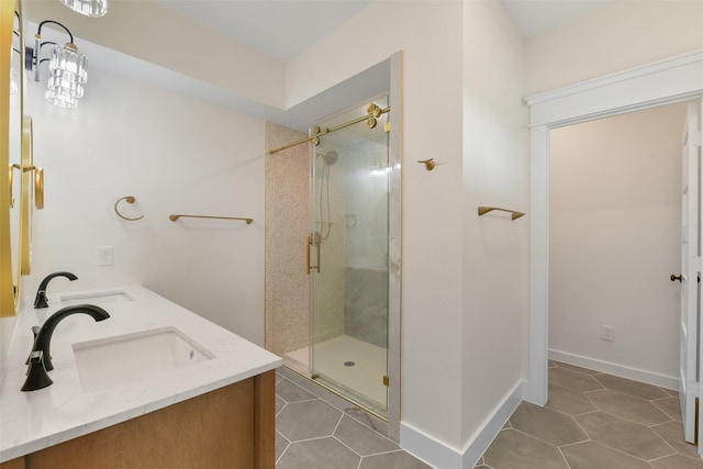 bathroom featuring an enclosed shower, tile patterned floors, and vanity