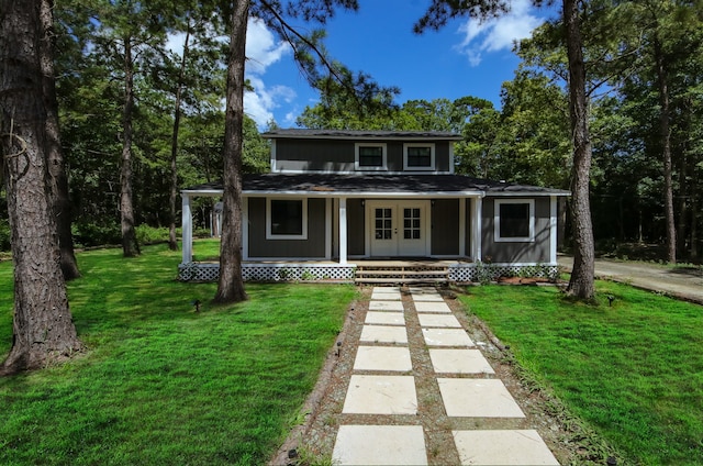 view of front of property with a front yard and covered porch