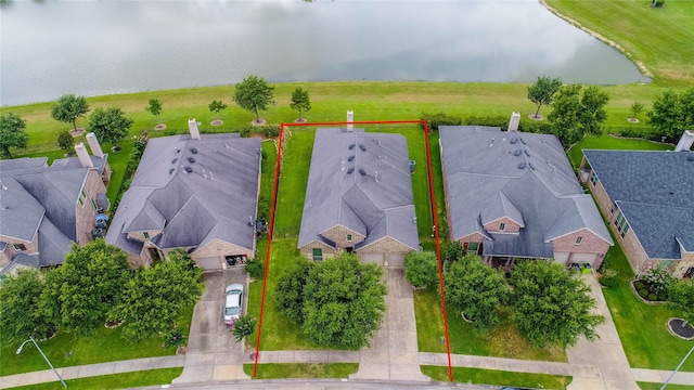 drone / aerial view featuring a water view