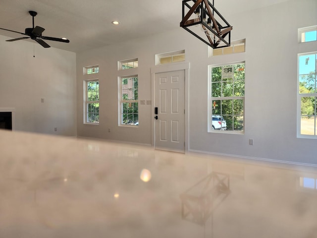 entryway with ceiling fan