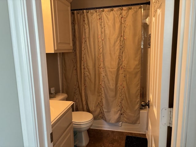 full bathroom with tile patterned flooring, shower / bath combination with curtain, toilet, and vanity