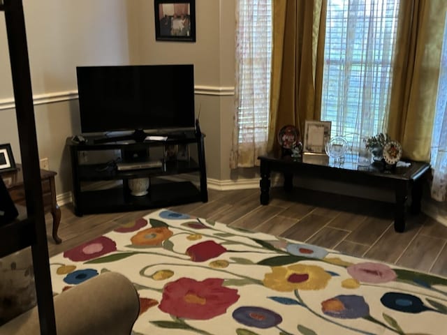 living room with wood-type flooring