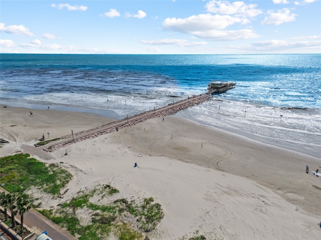 bird's eye view featuring a beach view and a water view