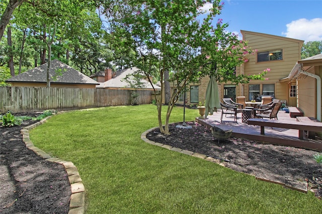 view of yard with a deck