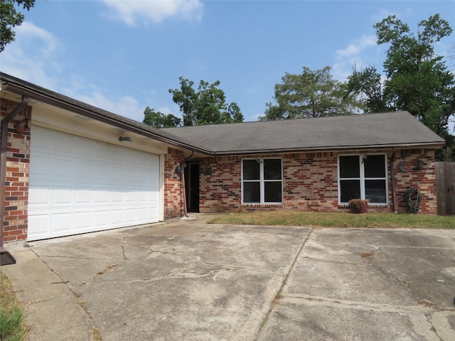 single story home with a garage