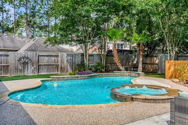 view of swimming pool with an in ground hot tub and pool water feature