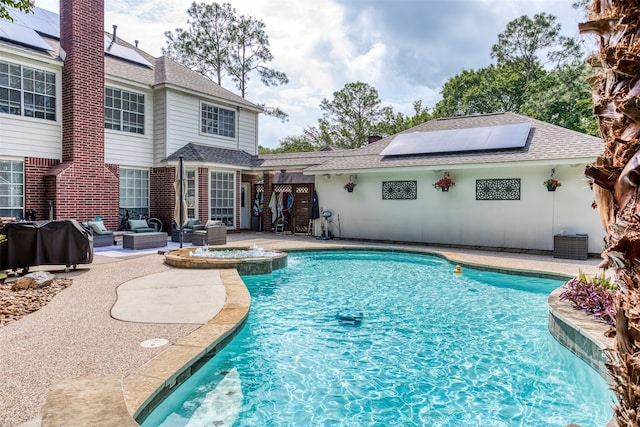 view of pool featuring a patio area and an outdoor hangout area