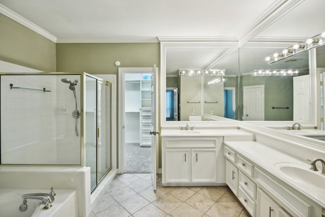 bathroom featuring tile patterned floors, separate shower and tub, and dual bowl vanity