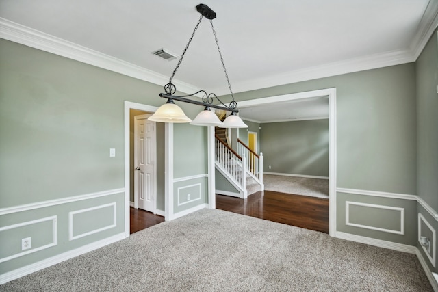 unfurnished dining area with dark hardwood / wood-style floors and ornamental molding