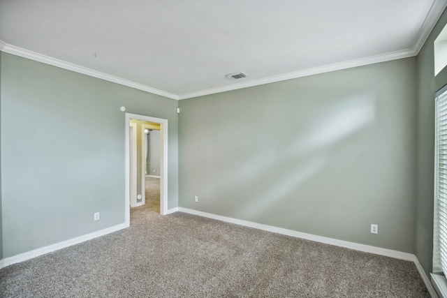 unfurnished room with carpet flooring and ornamental molding